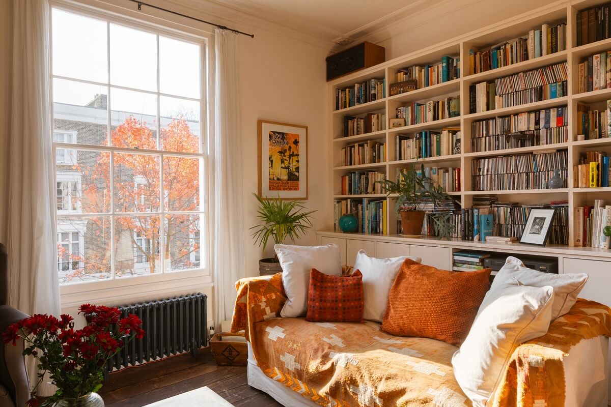 living-room-bookcases-orange-color-accents-nordroom