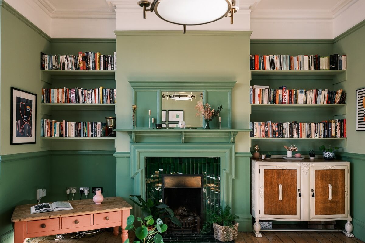 two-tone-green-walls-fireplace-built-in-shelves-nordroom