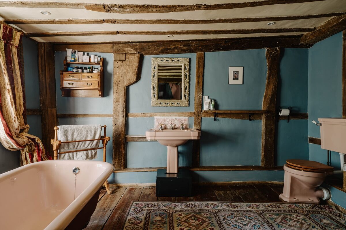 bathroom exposed beams blue walls english country house nordroom