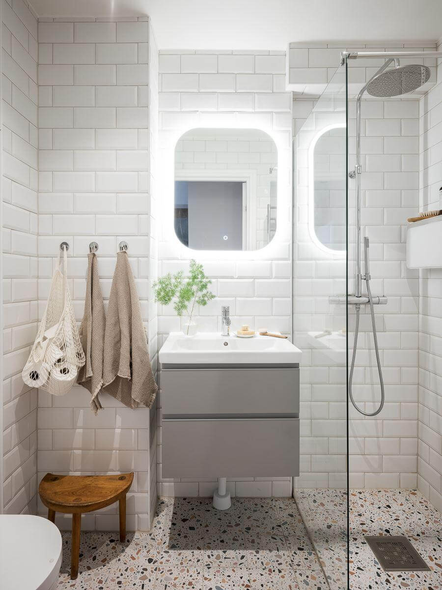 bathroom with terrazzo floor tiles and walk in shower nordroom