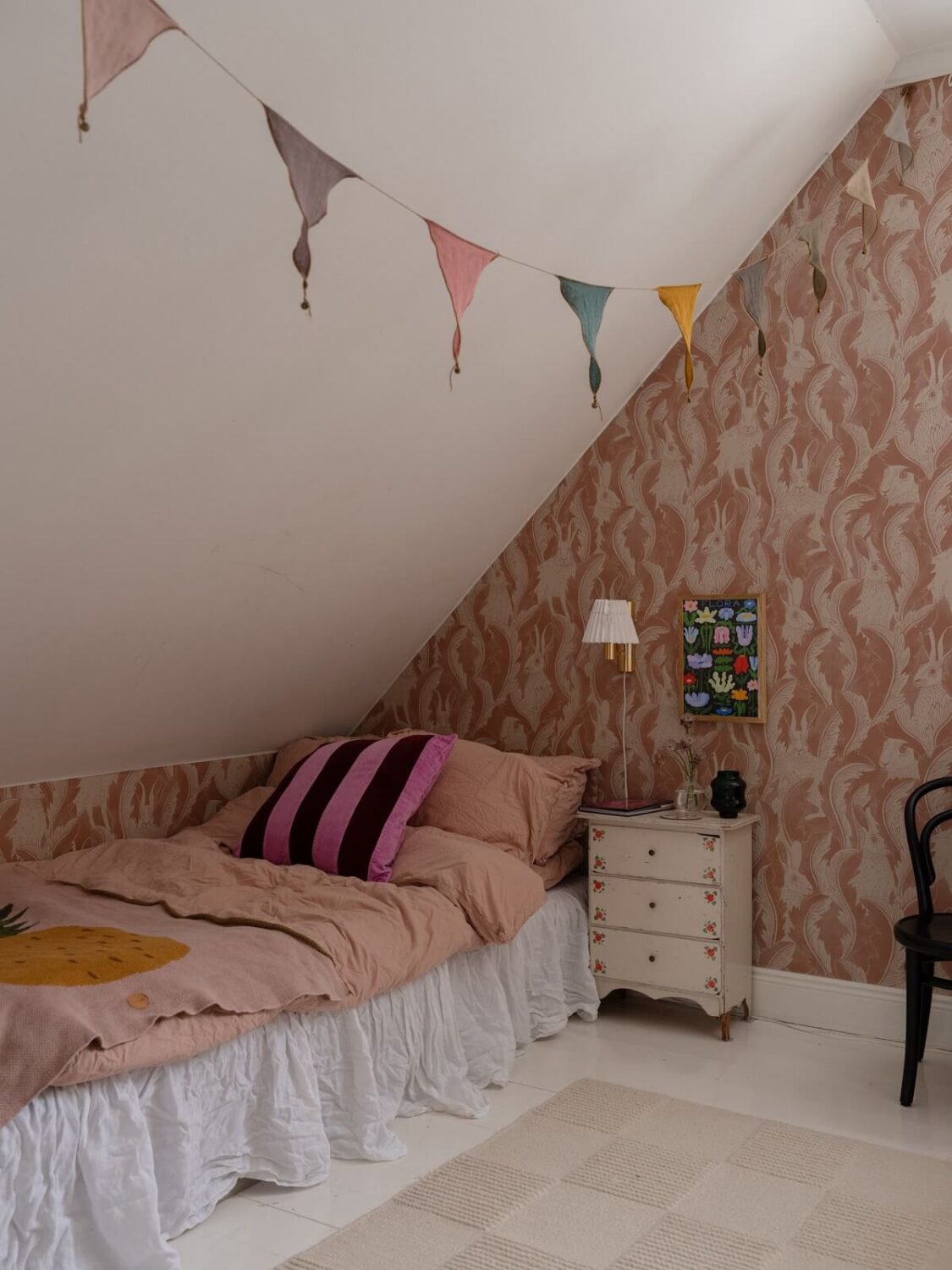 children room pink wallpaper slanted ceiling nordroom