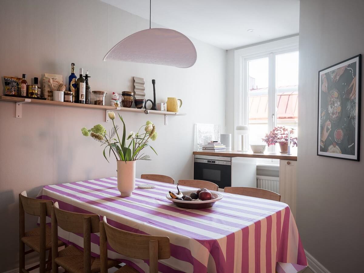 dining table with pink striped tablecloth nordroom