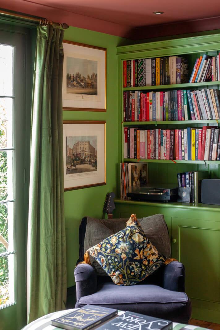 green-bookcases-pink-ceiling-nordroom