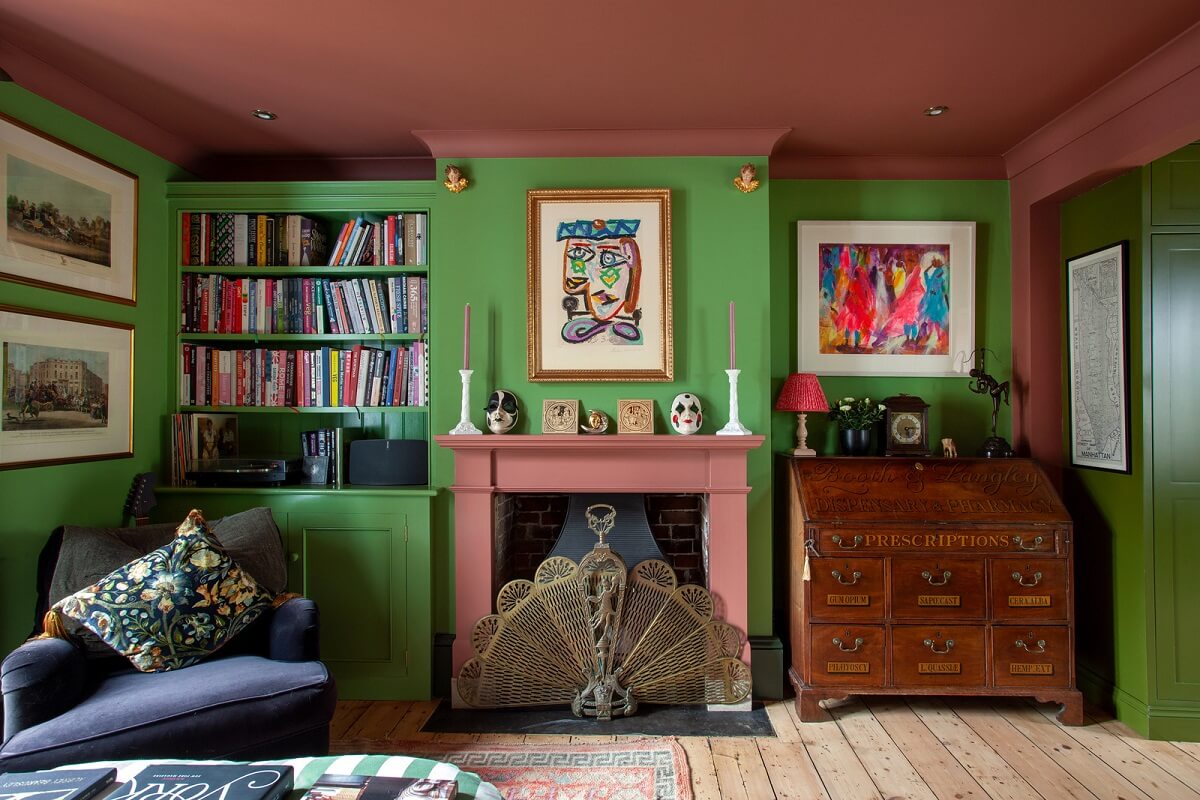 green-living-room-pink-ceiling-fireplace-nordroom