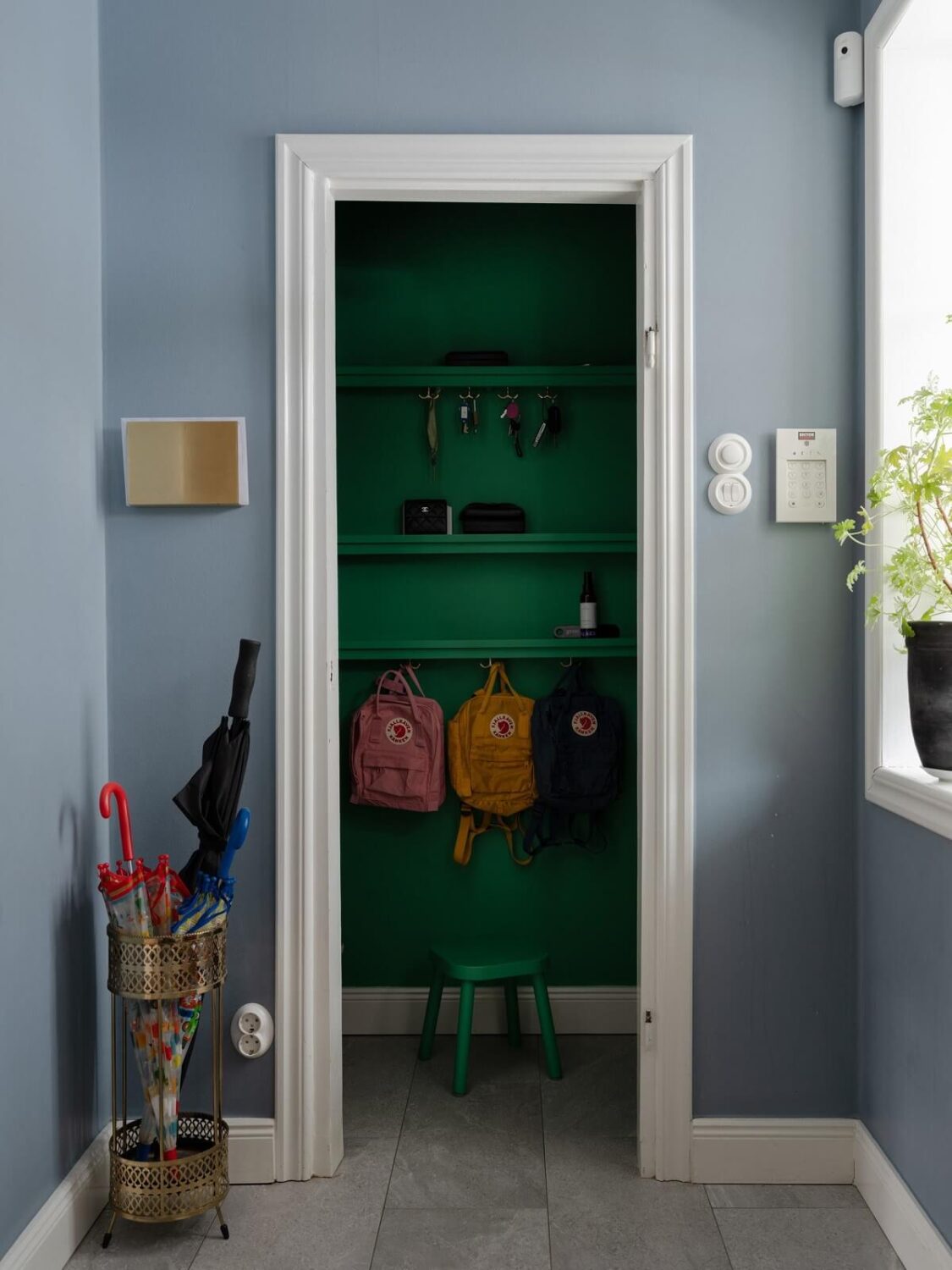 green painted hallway storage nordroom