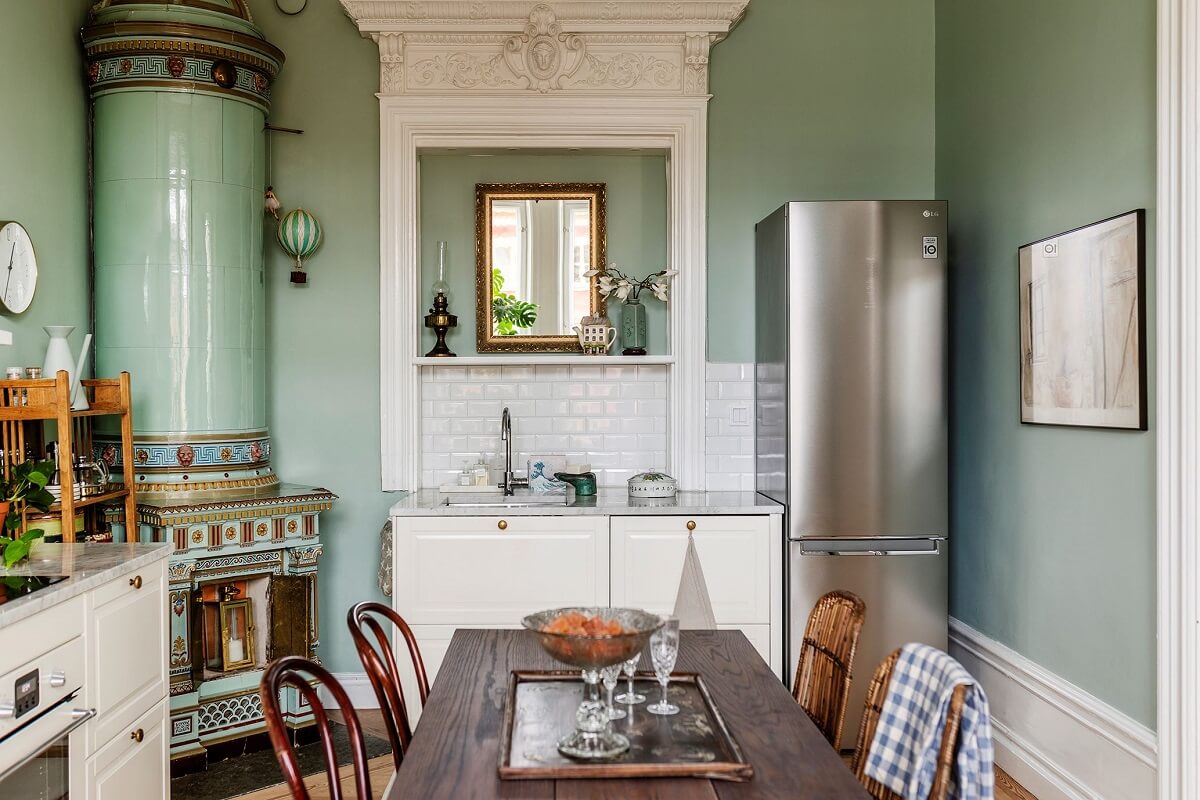 kitchen-white-cabinets-mint-green-walls-fireplace-nordroom