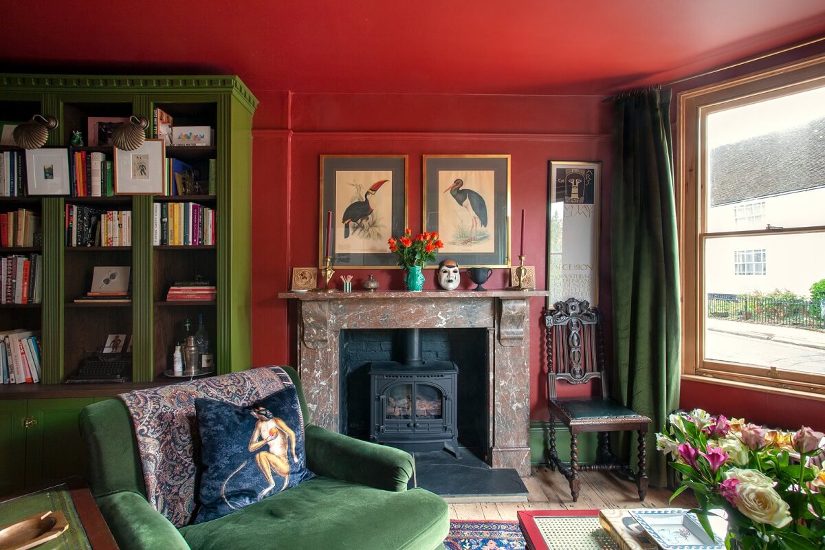 red-living-room-fireplace-green-bookcases-nordroom