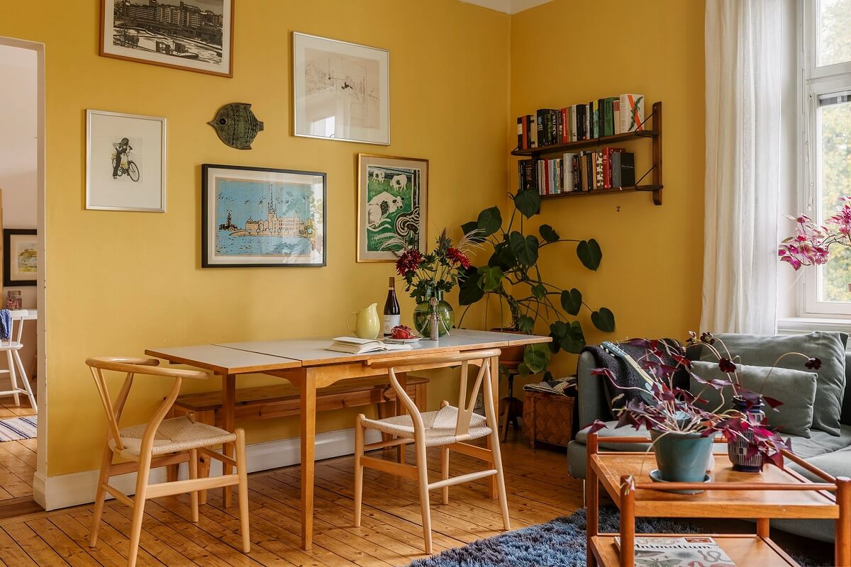 scandinavian living room with yellow walls and wooden floor nordroom