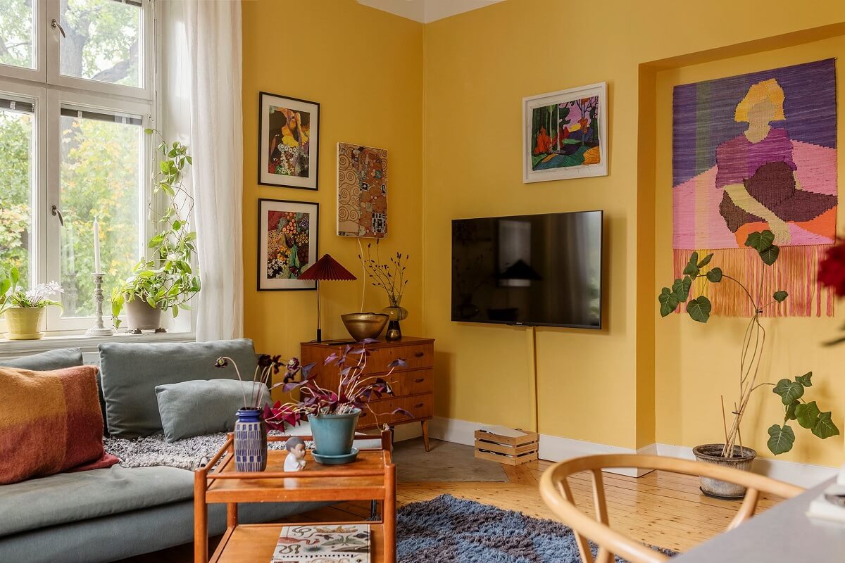 scandinavian living room yellow walls blue ikea sofa nordroom