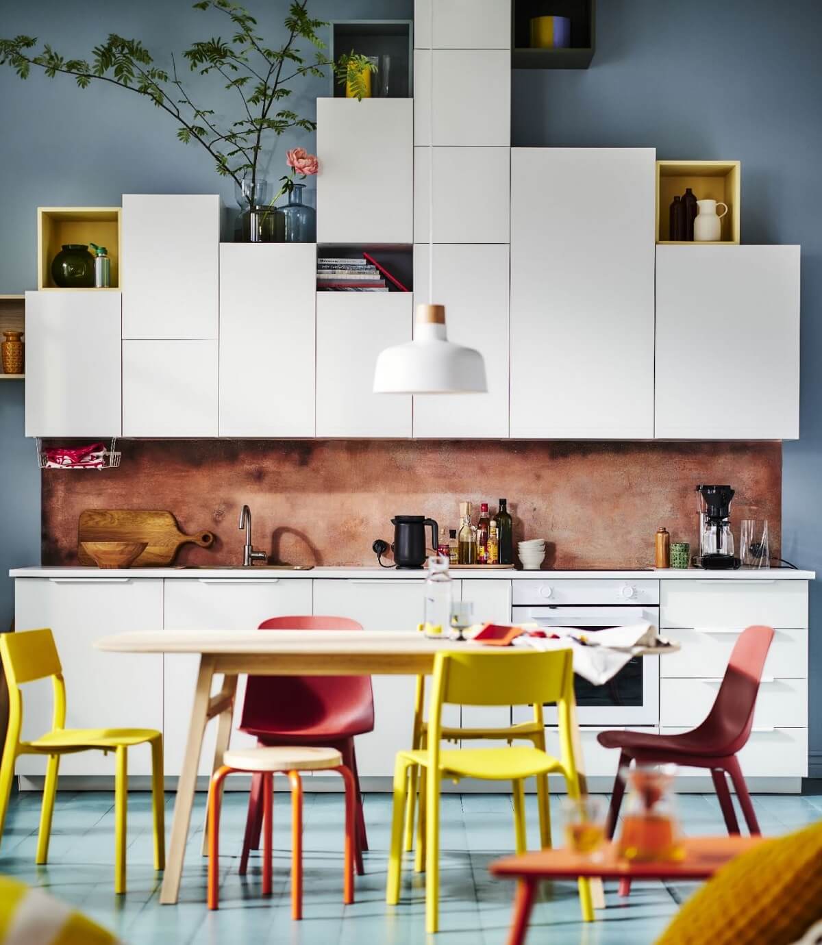 white-ikea-kitchen-colorful-chairs-nordroom