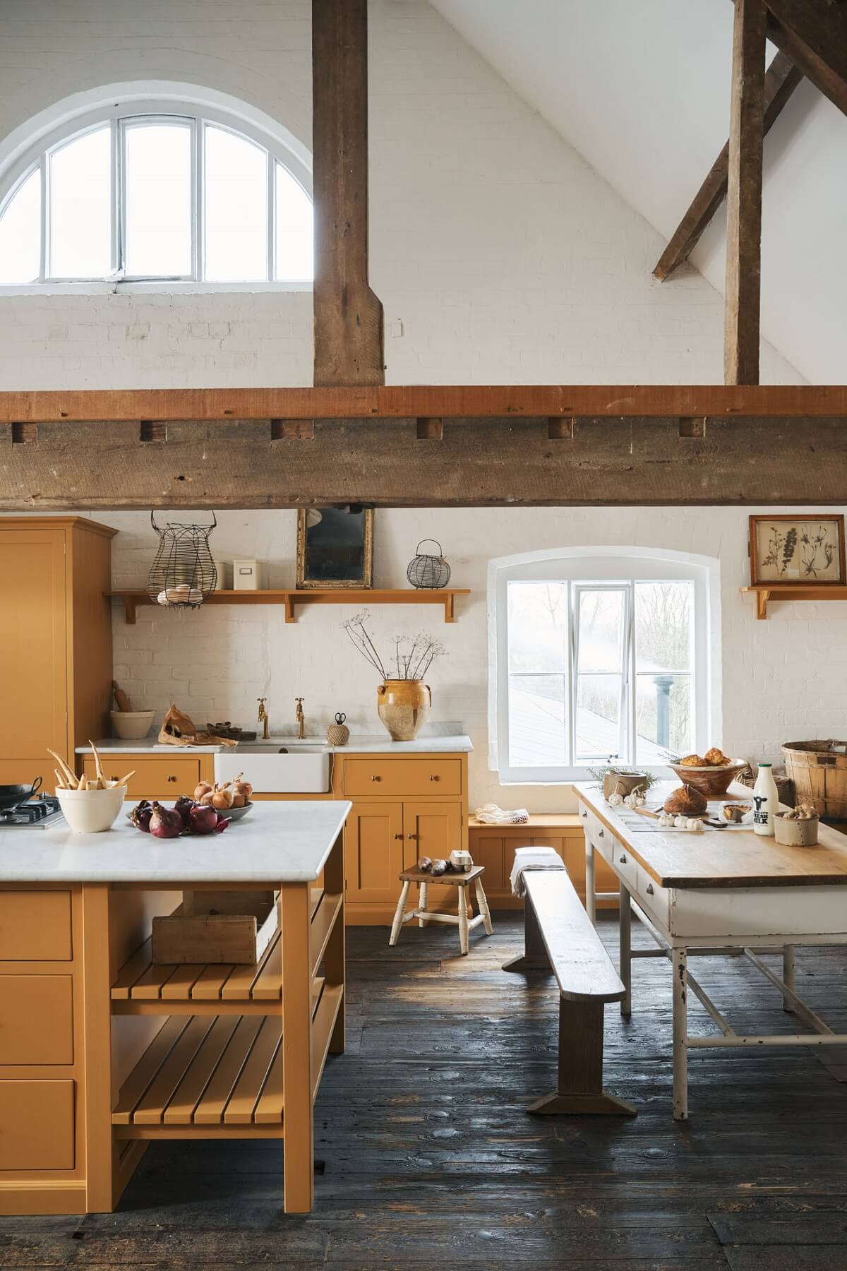 A Yellow Mediterranean-style deVOL Kitchen with High Ceilings