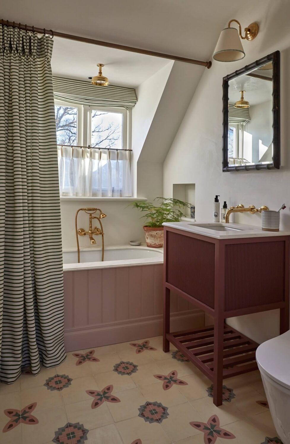 bathroom with red sink table