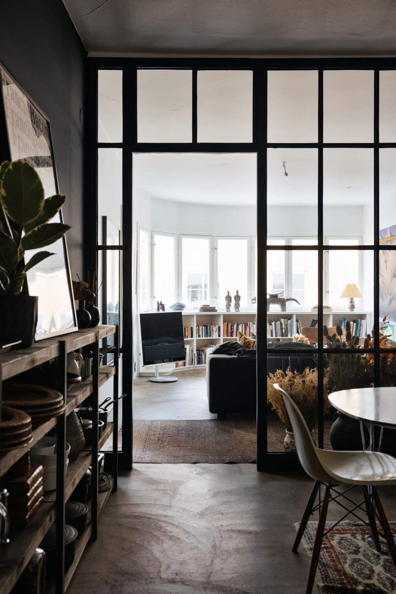 An Industrial Apartment with Black Walls