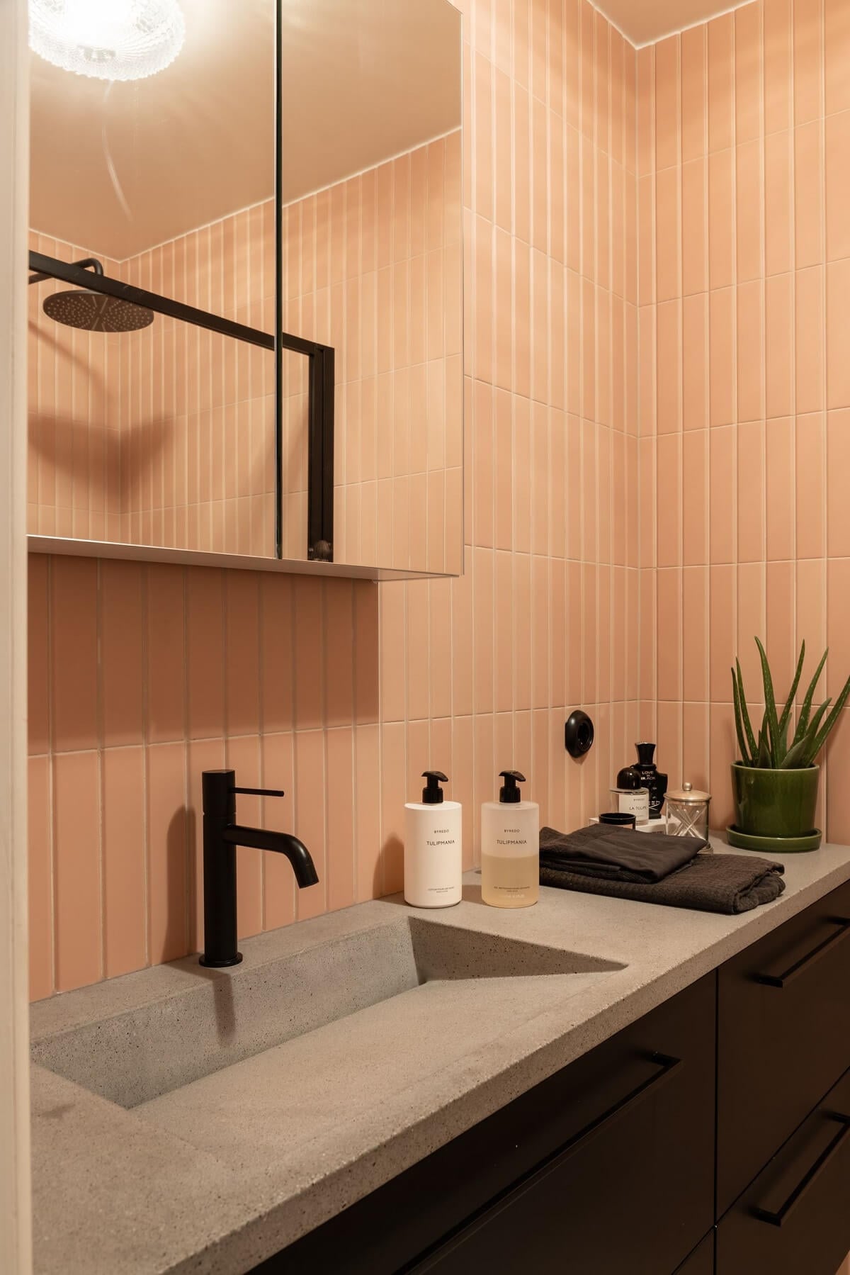 Curated visual reference: Swedish Apartment Travertine Tile Patterns Reference: A Renovated Swedish Apartment With A Pink Bathroom