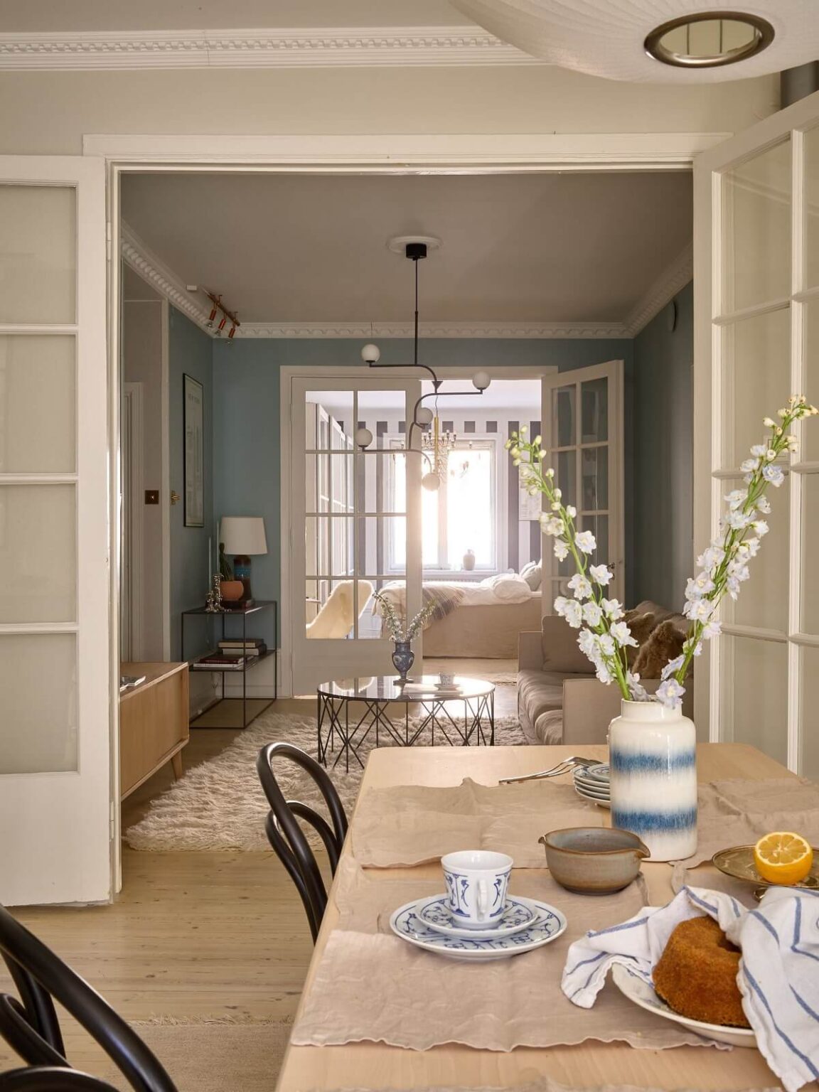 Snapshot of Blue Accent Wall In Scandinavian Apartment