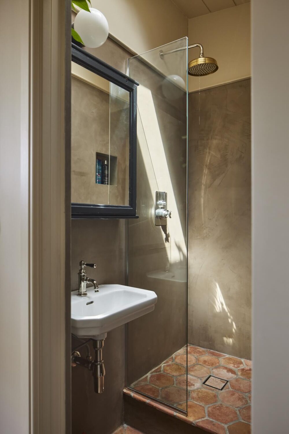 gray bathroom with stone floor