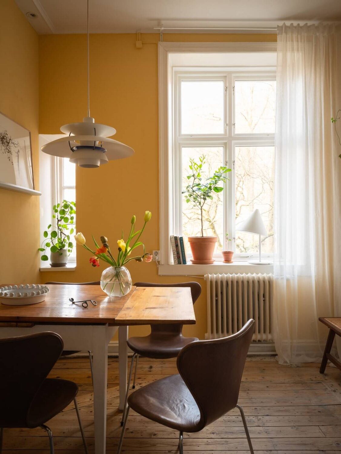 kitchen dining table and yellow walls