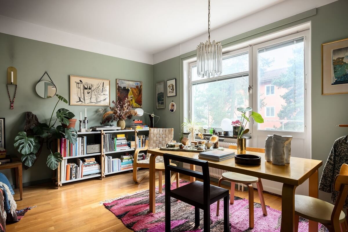 large wooden table and plants studio