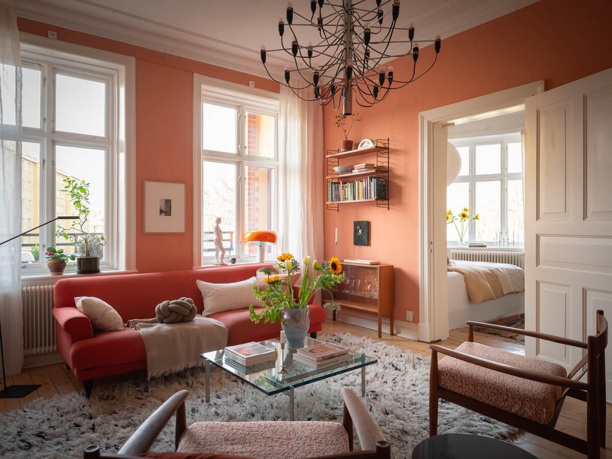 living room with terracotta shade color on walls