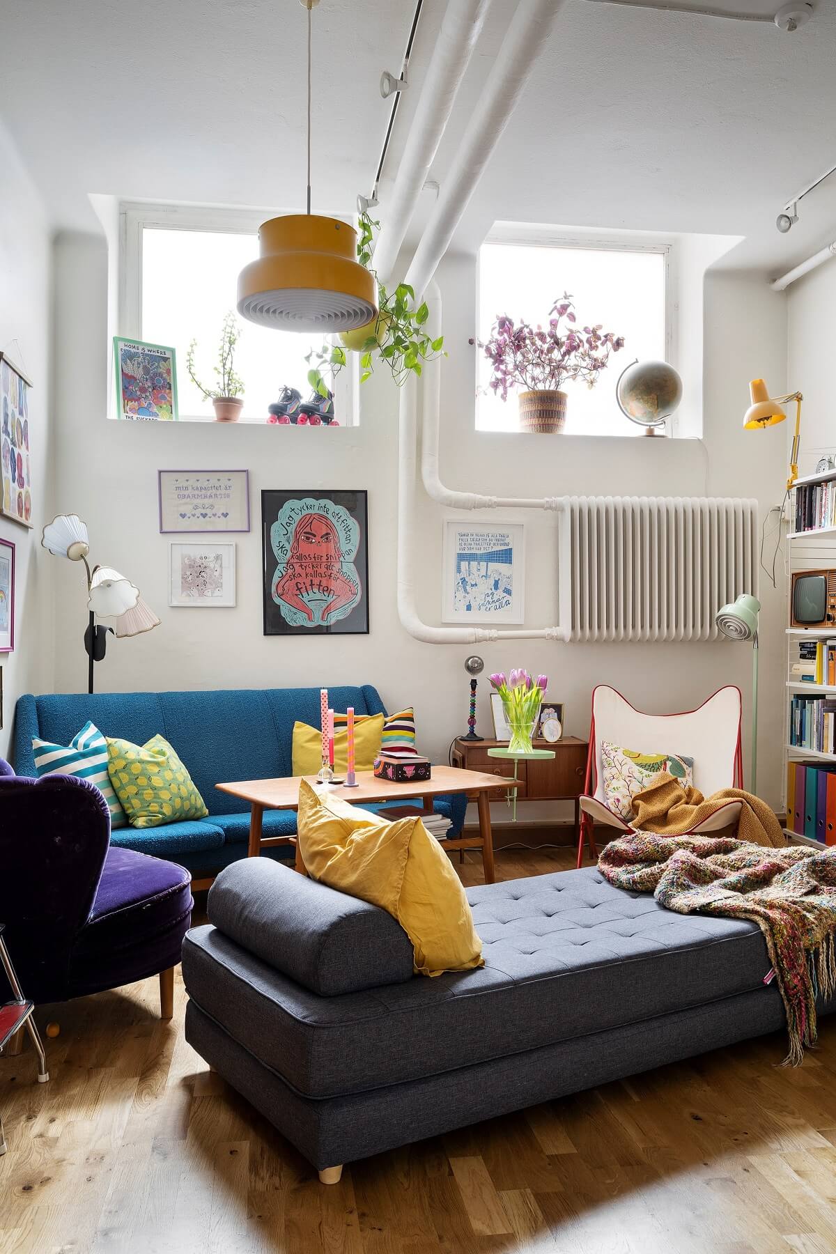 loft style living room with colorful decor
