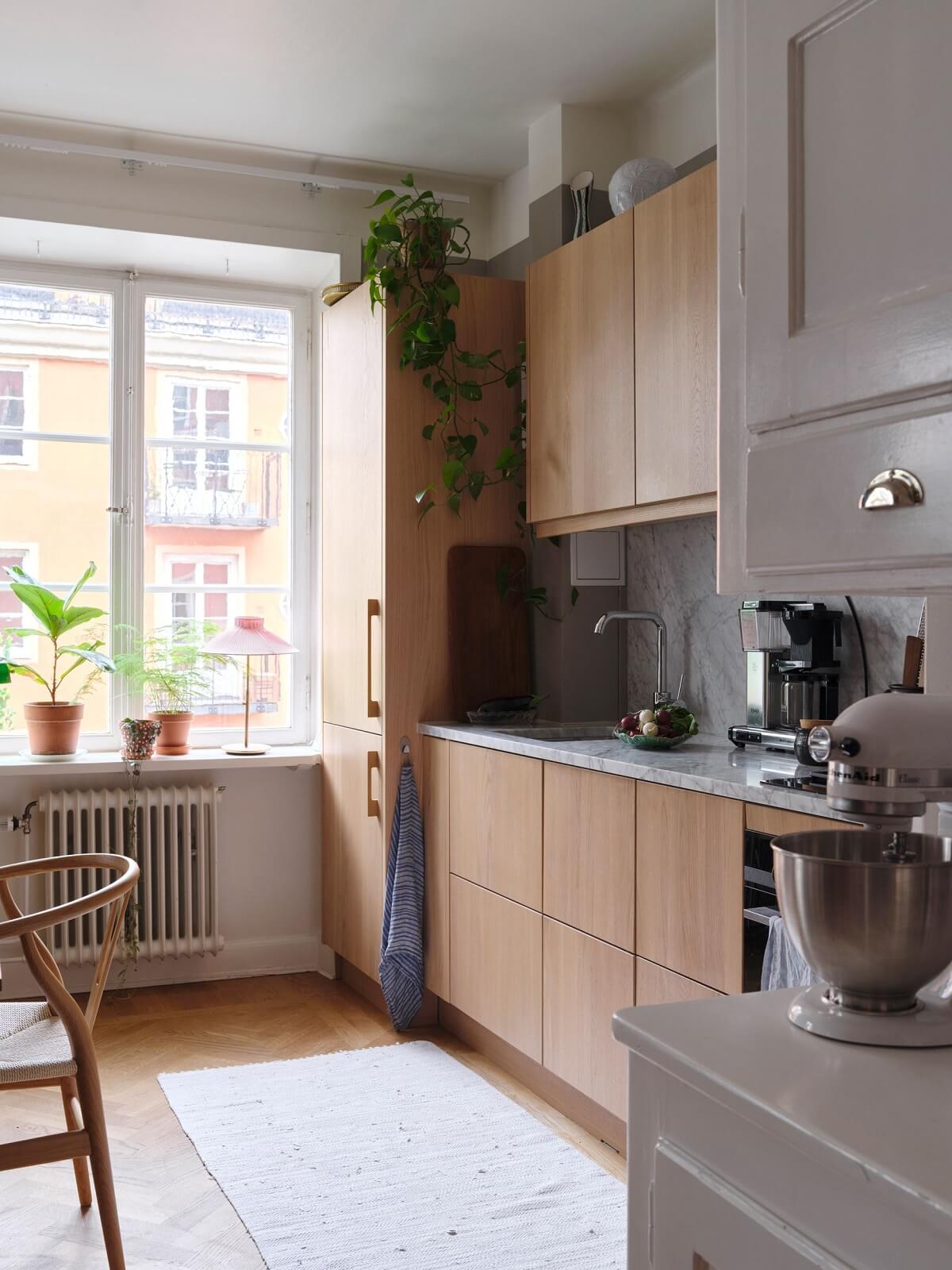 Image showcasing A Small Gray Apartment with Industrial Glass Walls - The Nordroom