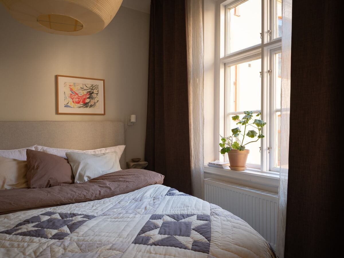 serene bedroom with dark curtains