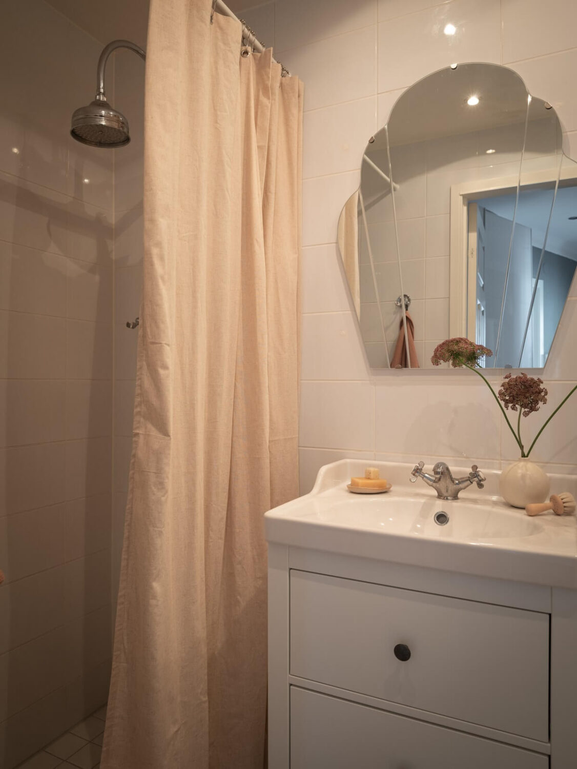 small bathroom with white tiles