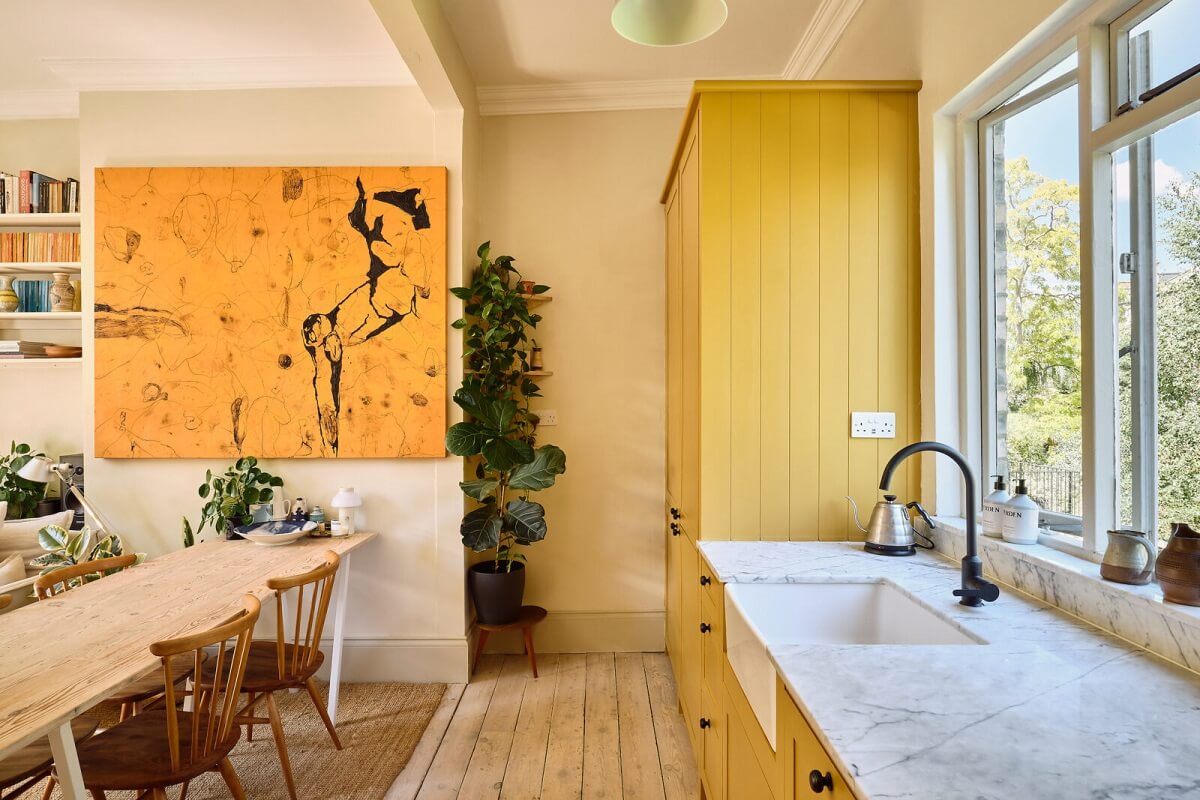 yellow kitchen in london apartment