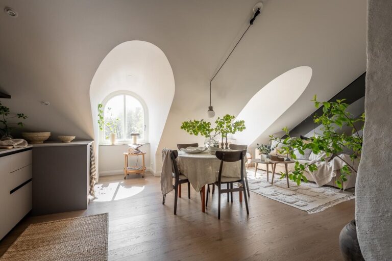 An Attic Studio Apartment with a Glass Room Divider - The Nordroom