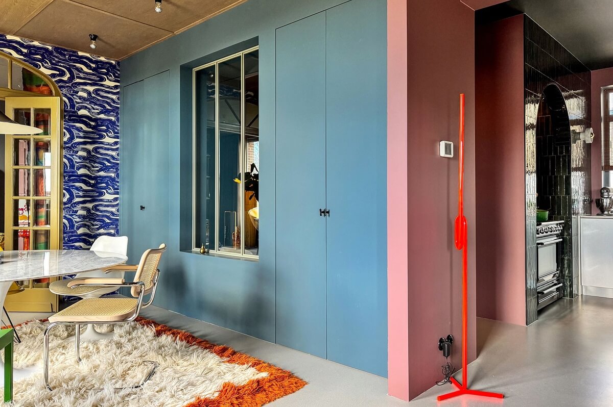 blue dining room with built in cabinets