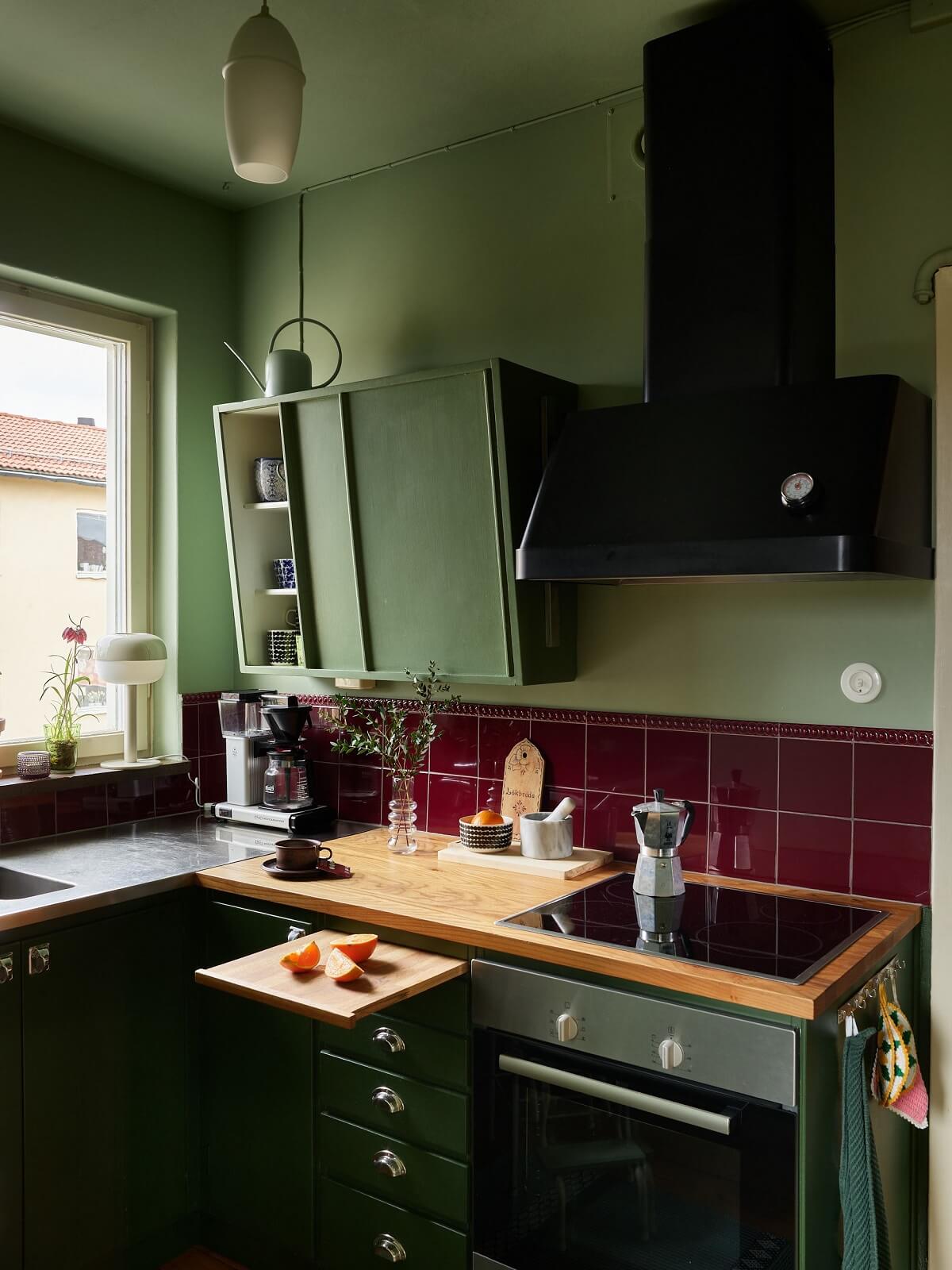 green midcentury kitchen with pink tiles nordroom