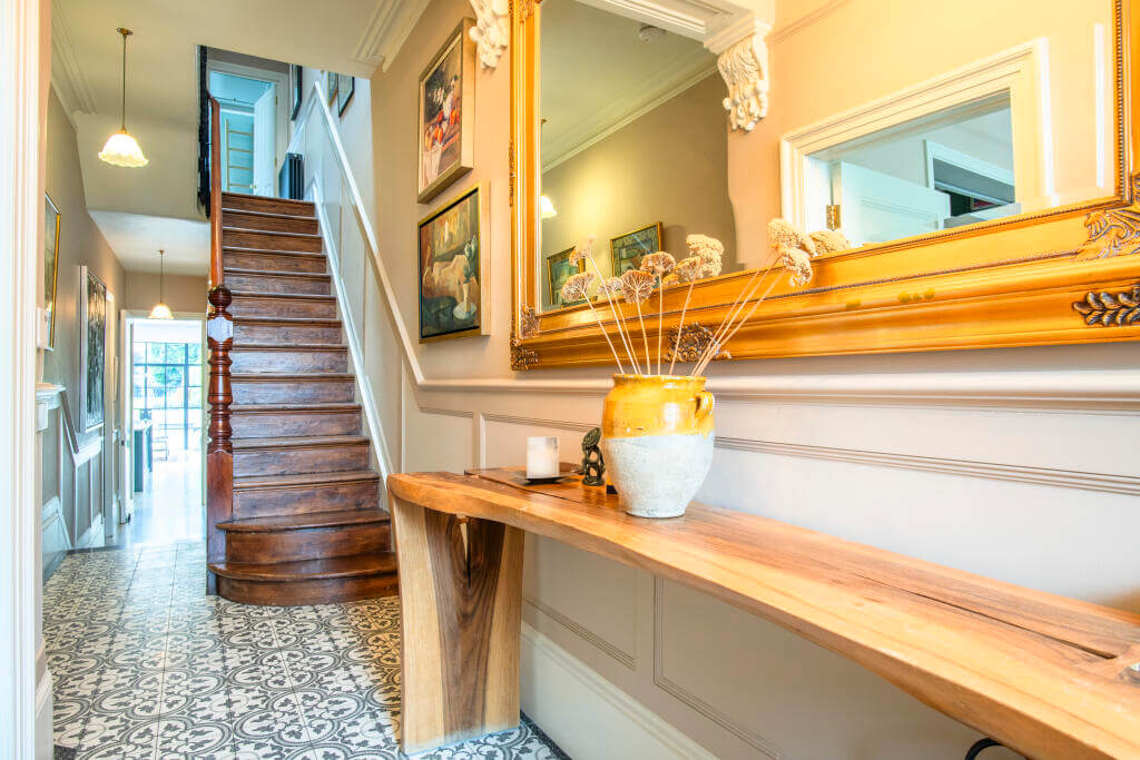 hallway with wooden sidetable