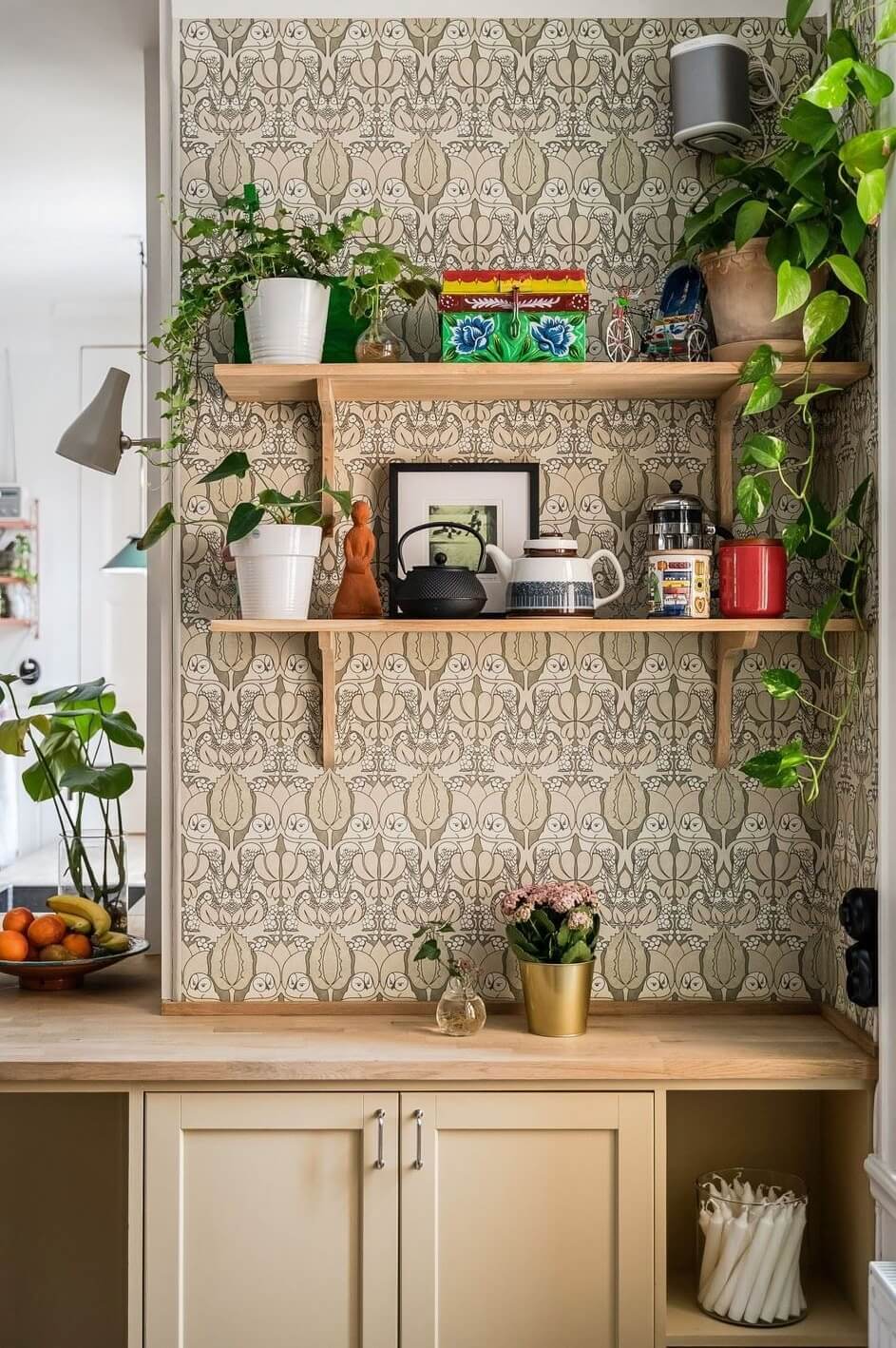 kitchen with shelves and wallpaper