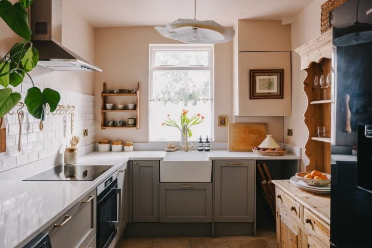 light gray kitchen with butler sink and setting plaster farrow and ball walls nordroom