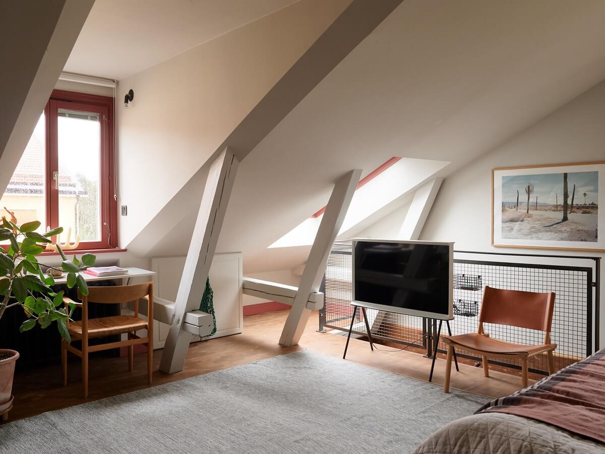 attic bedroom with desk under window nordroom