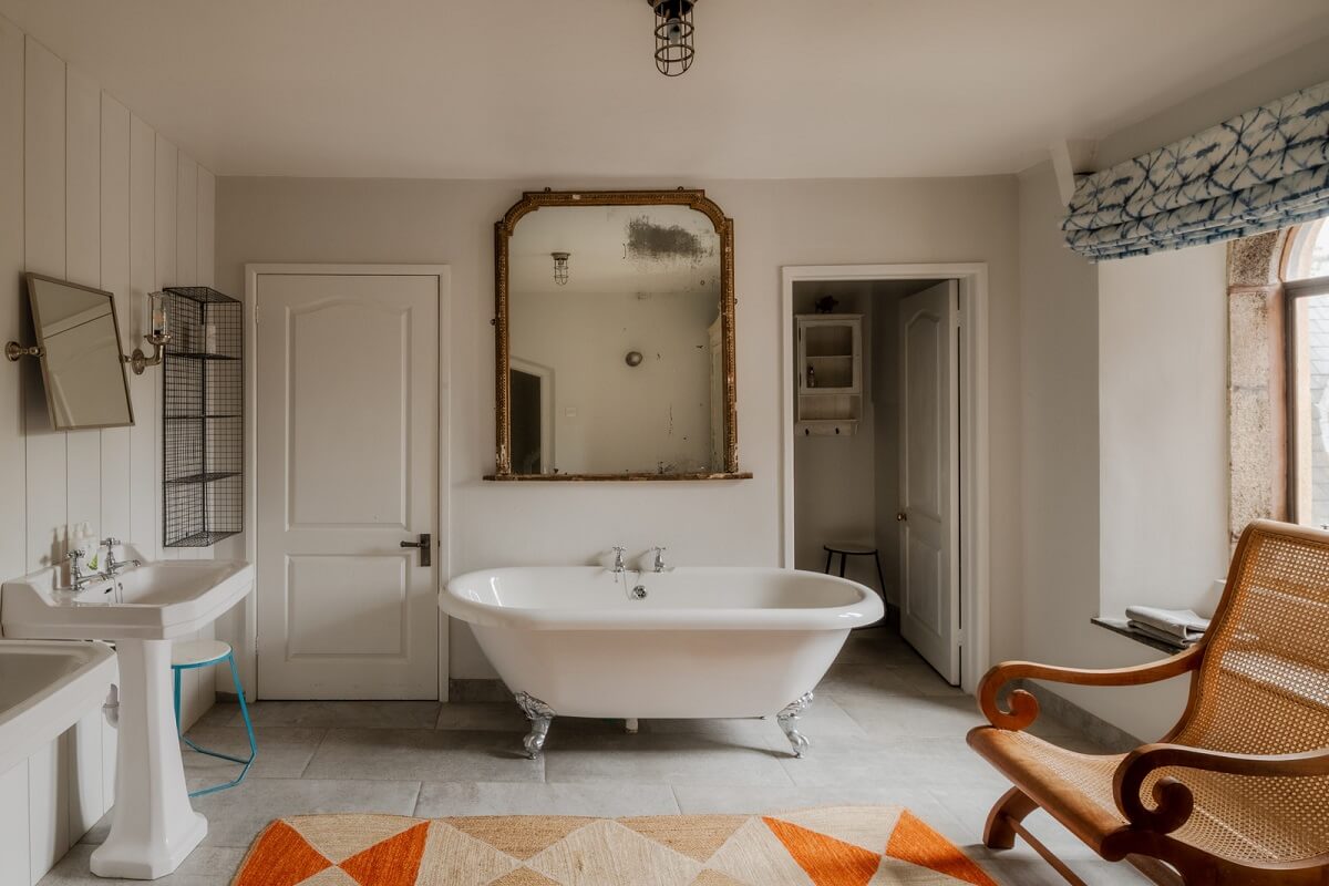 A Charming Gothic-Style Home with Original Details 24 bathroom with clawfoot bath