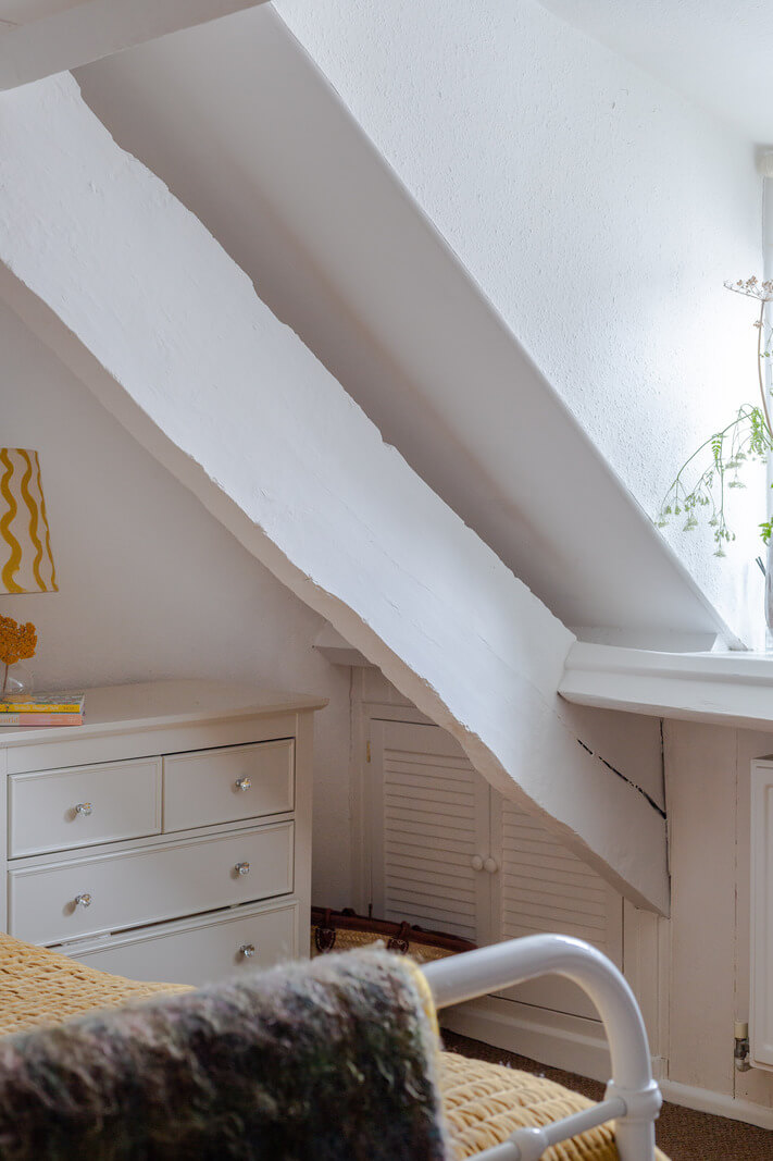 bedroom slanted ceiling A Charming 400-Year-Old Cottage in England