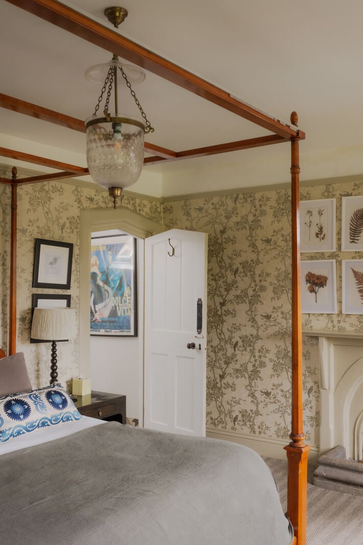 A Charming Gothic-Style Home with Original Details 21 bedroom with canopy bed wallpaper