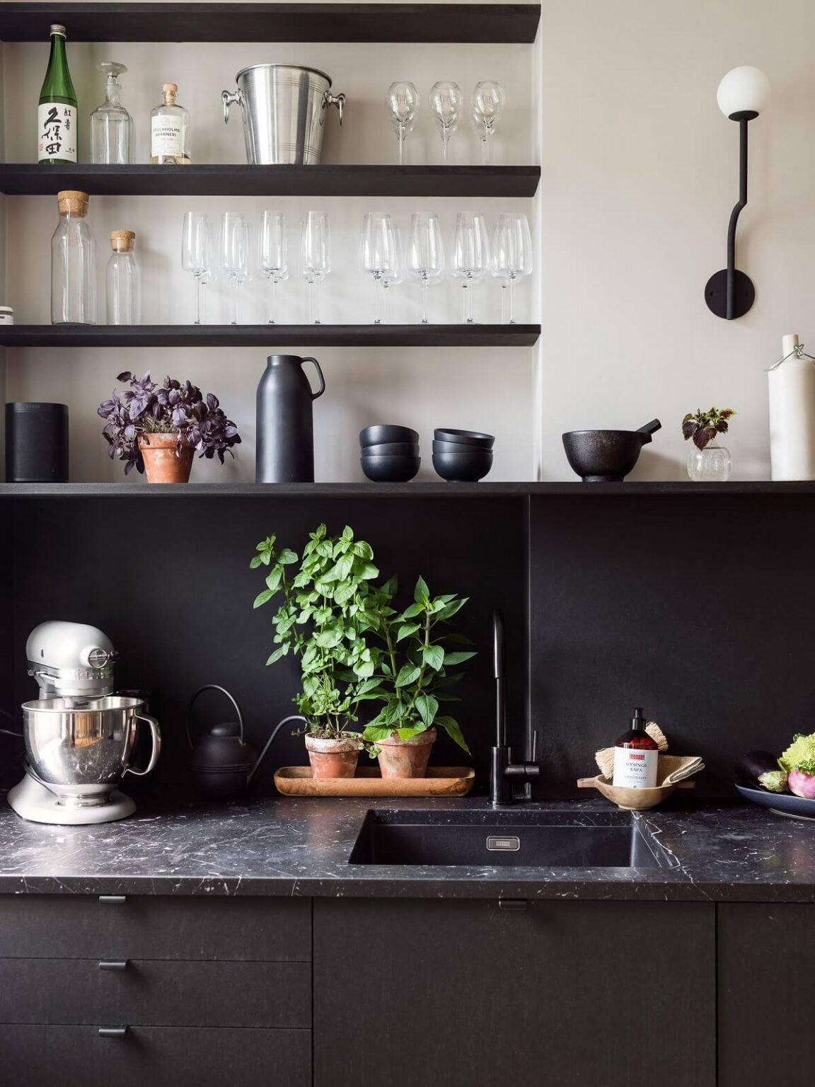A Gray Stockholm Apartment with a Black Kitchen - The Nordroom