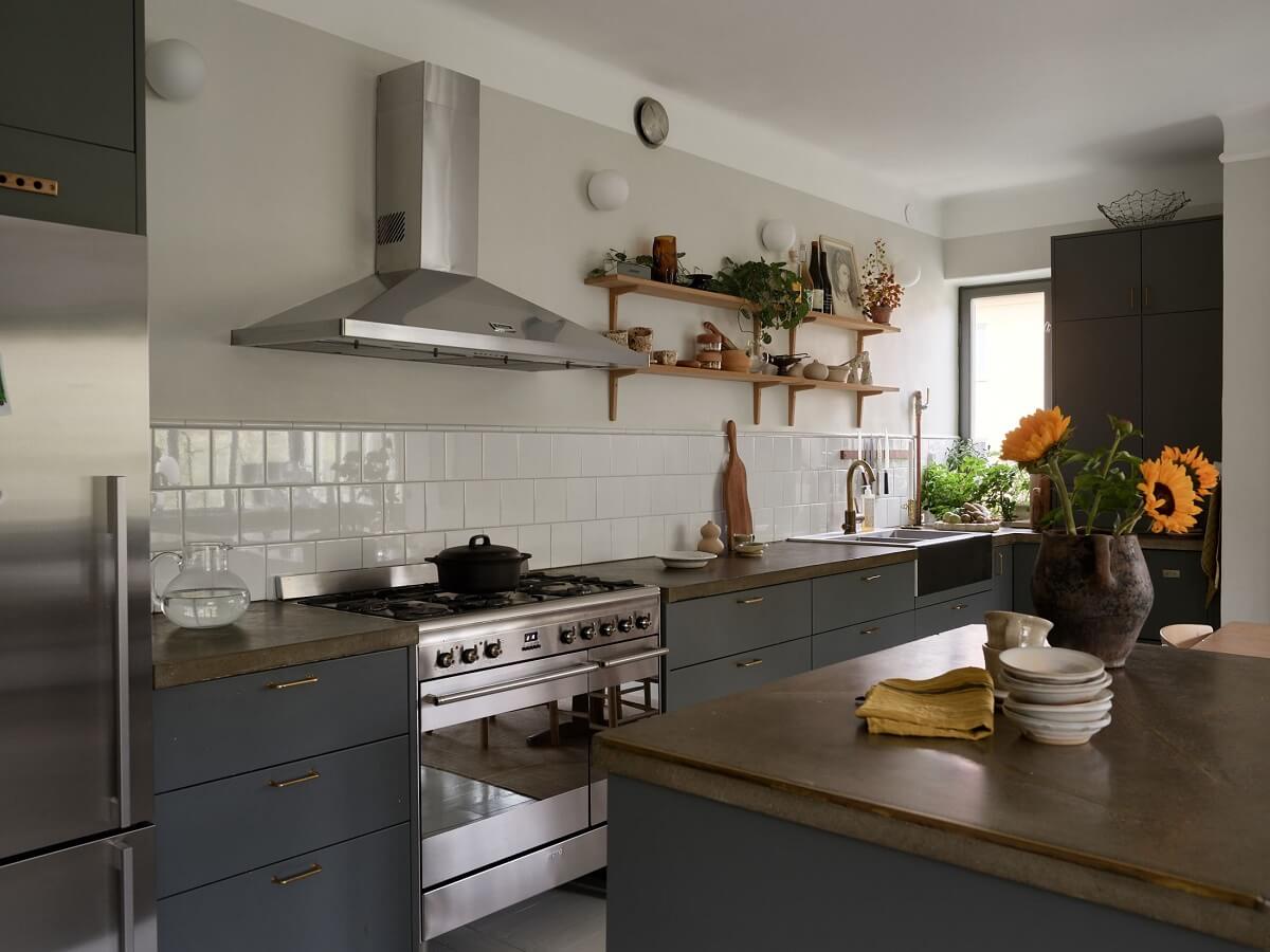 blue cupboards and white tiles