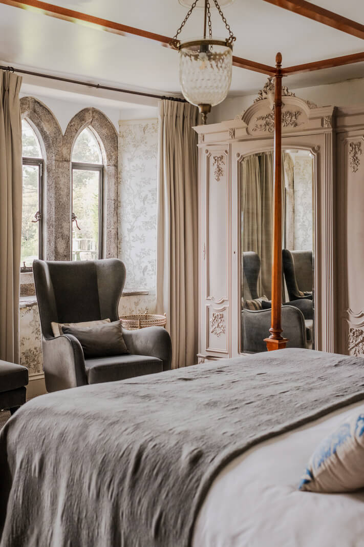 A Charming Gothic-Style Home with Original Details 20 canopy bed historic bedroom