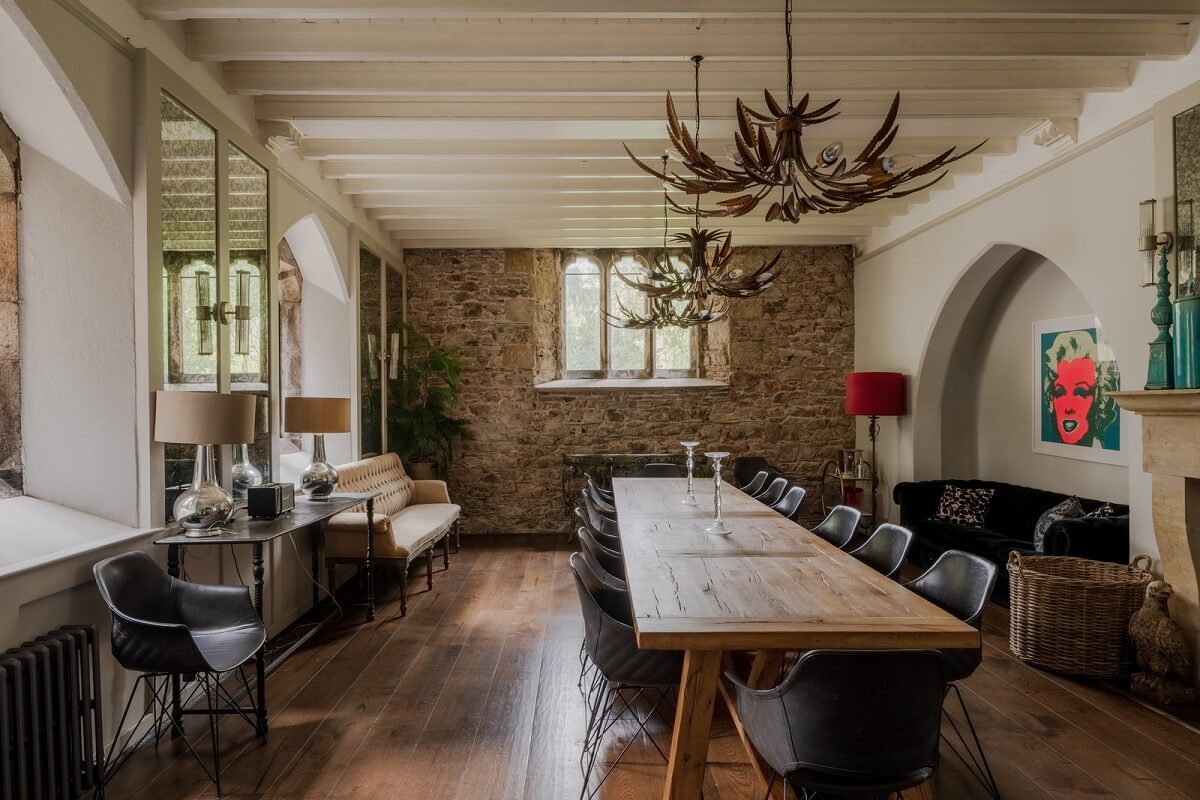 A Charming Gothic-Style Home with Original Details 13 dining room with exposed brick wall nordroom