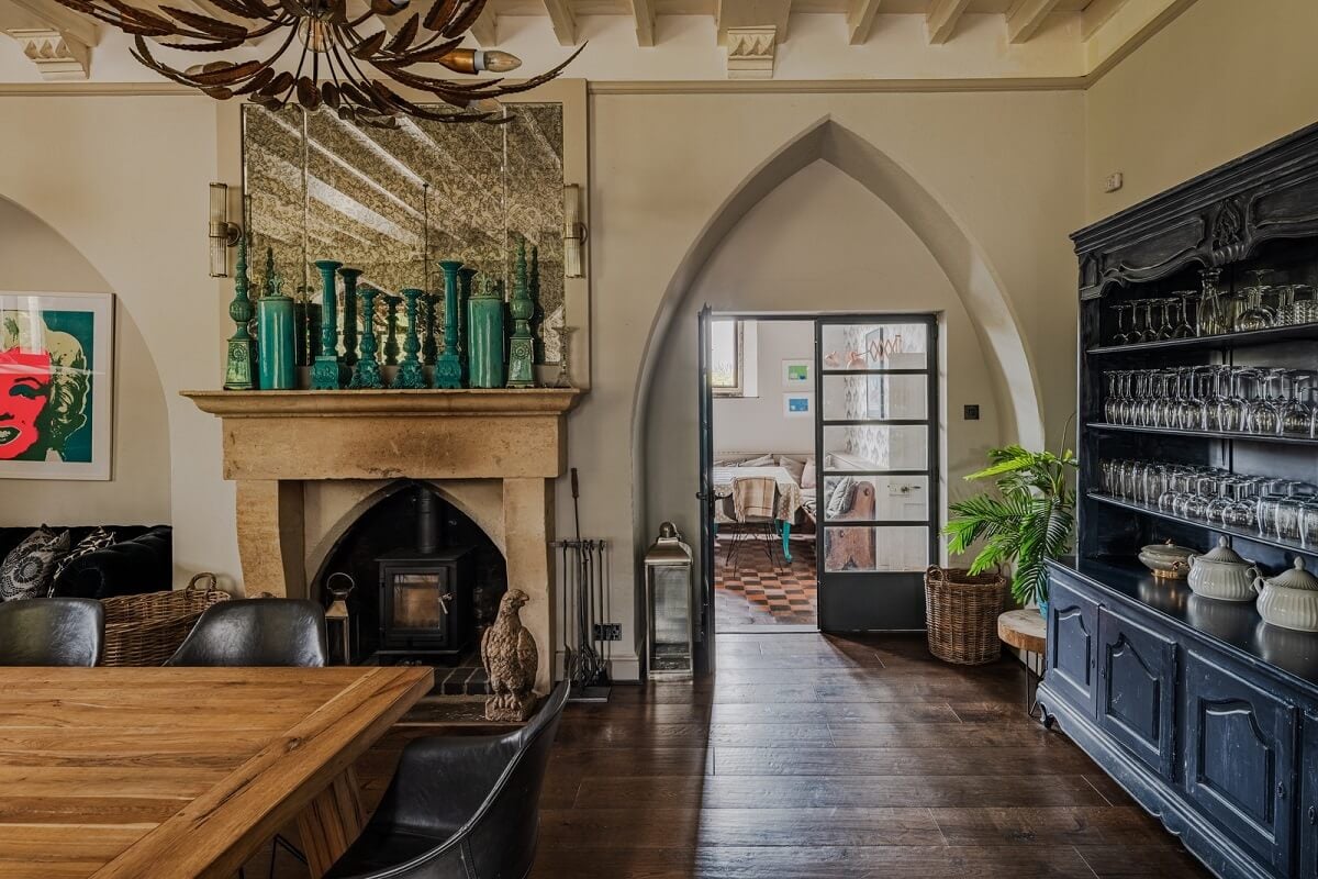A Charming Gothic-Style Home with Original Details 14 gothic arch in dining room nordroom