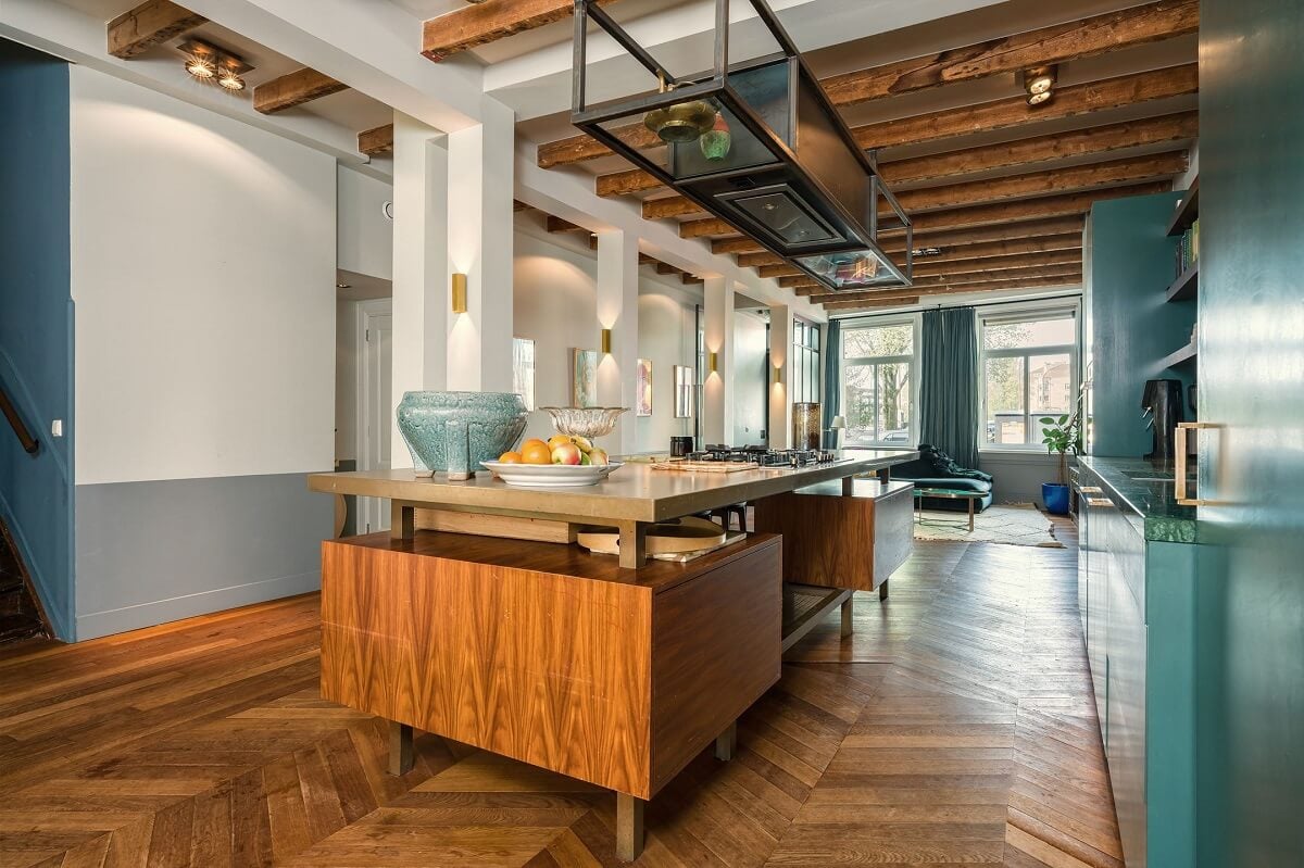 A Colorful Family Home with Open-Plan Spaces in Amsterdam 5 kitchen with wooden island and chevron floor nordroom