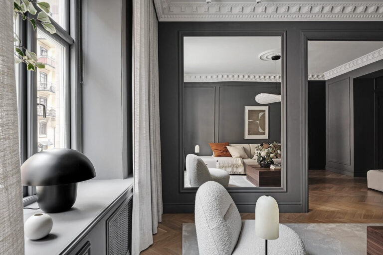 Image showcasing A Luxurious Renovated Apartment with Dark Gray Walls - The Nordroom