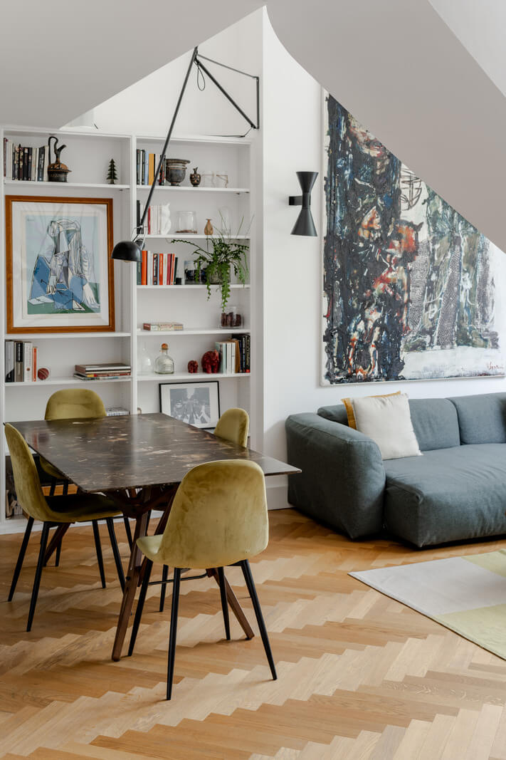 living room with herringbone parquet and built in bookshelves nordroom