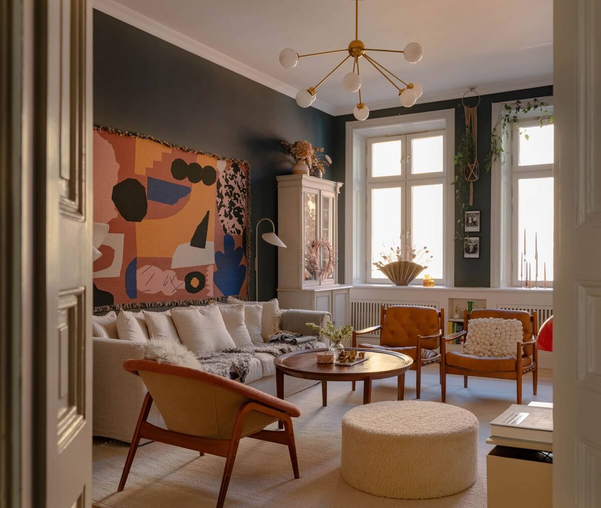 moody living room with colorful art