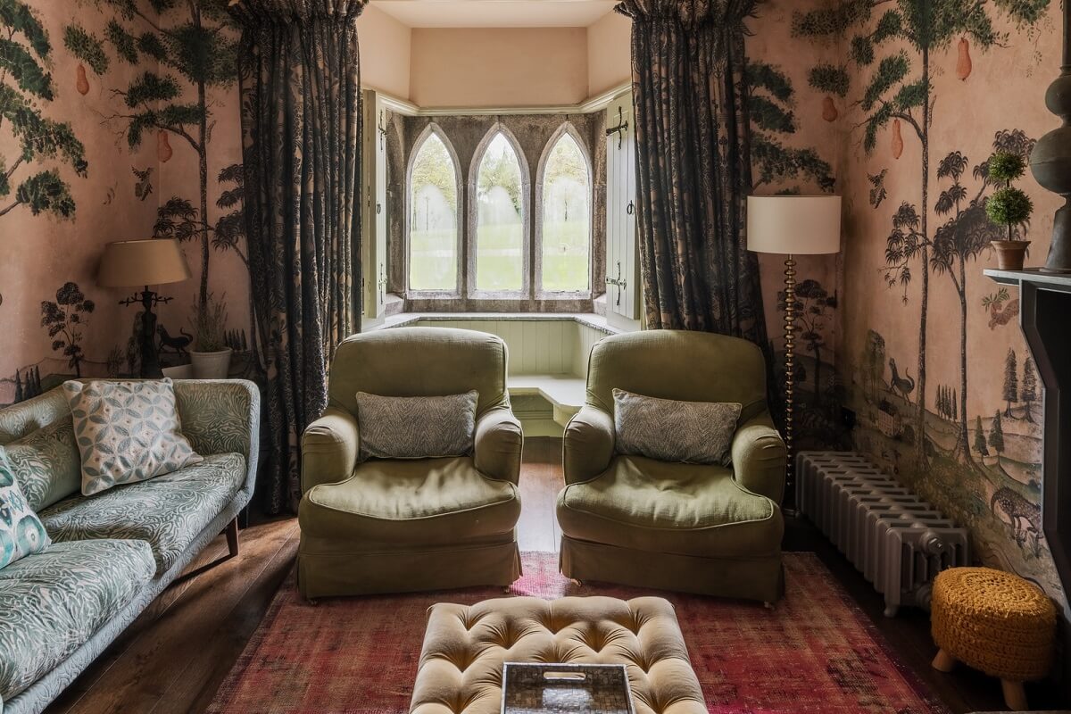 A Charming Gothic-Style Home with Original Details 4 pink house of hackney wallpaper and gothic windows nordroom