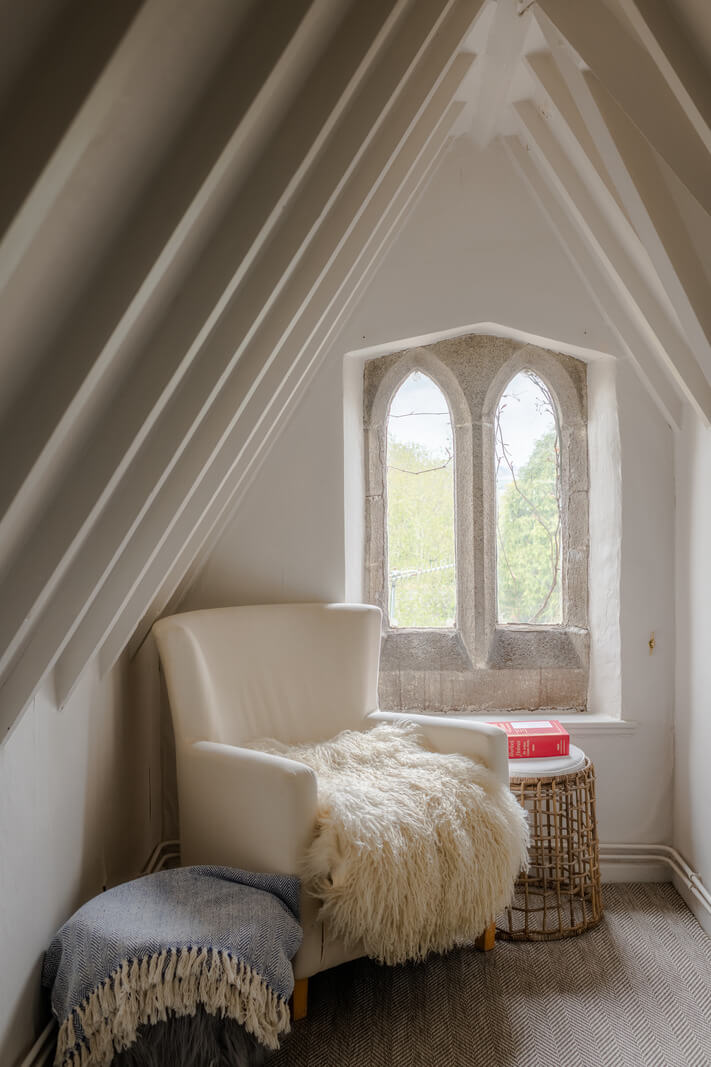 A Charming Gothic-Style Home with Original Details 30 sitting chair