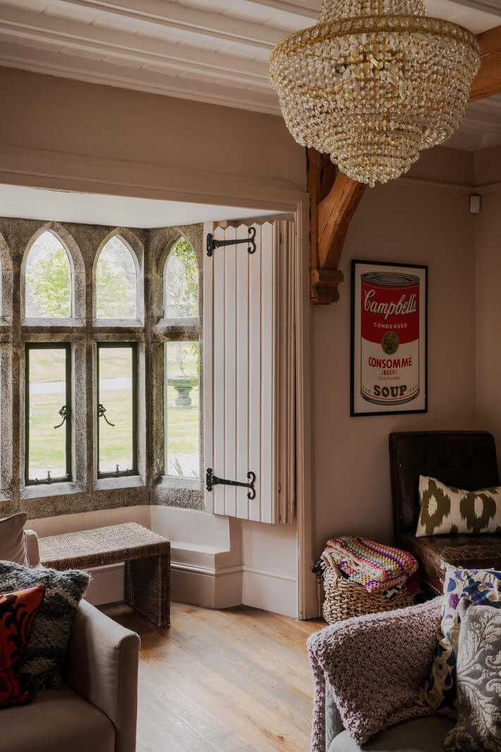 A Charming Gothic-Style Home with Original Details 17 sitting room with gothic windows